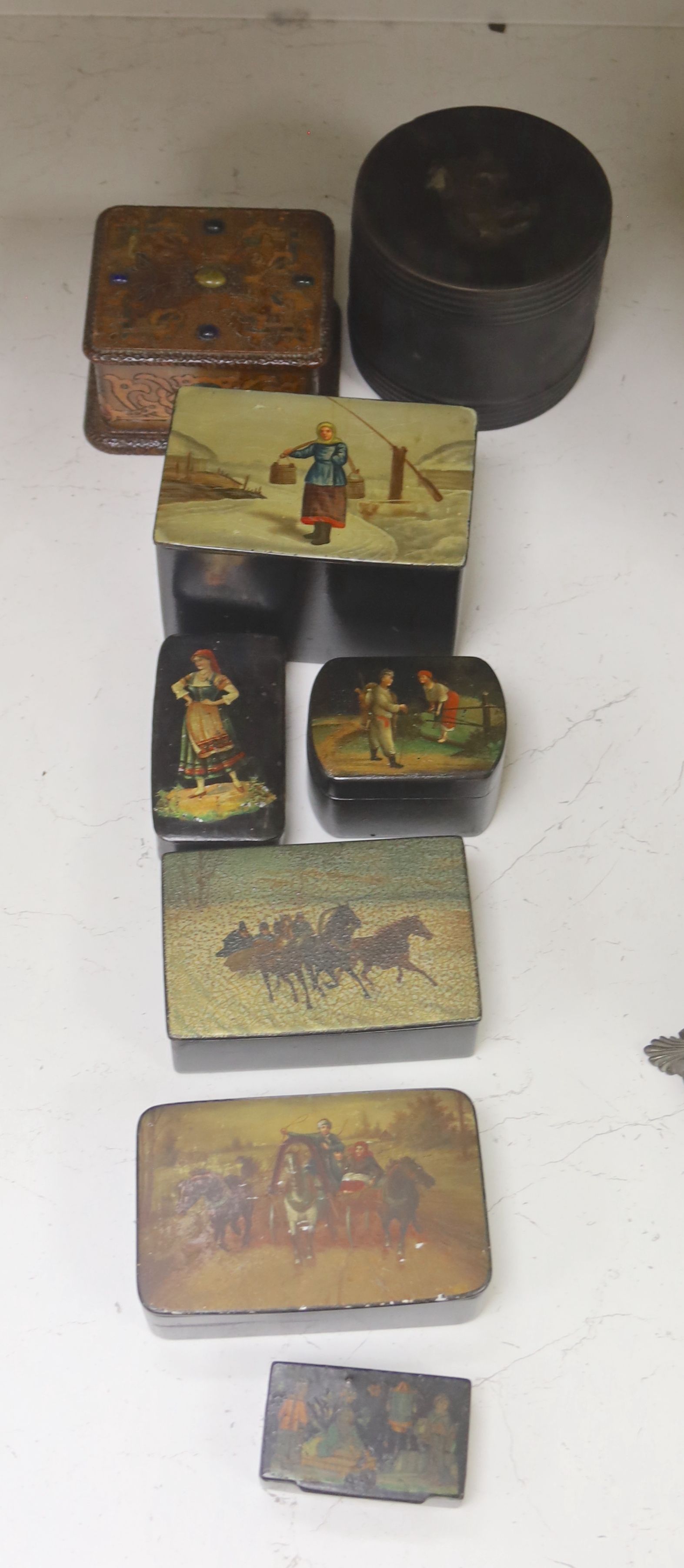 A collection of six Russian and European lacquer boxes, largest 14 x 9cm 9cm high, together with a papier mache snuff box and another decorative box (8)